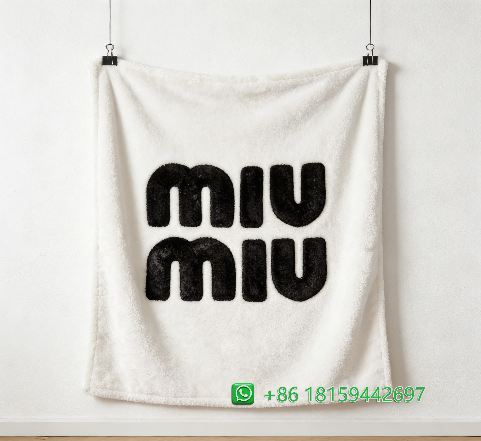 Miumiu Throw Blankets